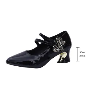Detail view of black patent Mary Jane pump with rhinestone butterfly and 5.5cm heel