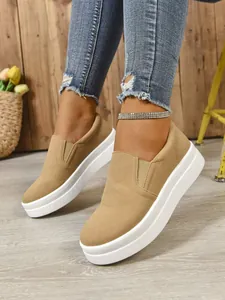 Stylish tan faux suede slip-on platform sneakers for women casual daily street wear.