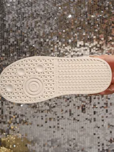 Close-up of the durable anti-slip rubber sole pattern for women's winter snow boots