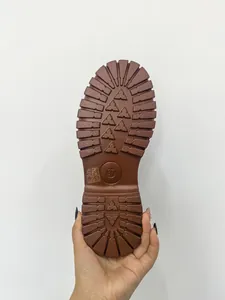 Close-up of thick brown rubber sole for Martin boots with anti-slip tread