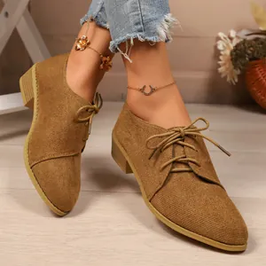 Stylish brown suede pointed toe side lace-up loafers for women with a comfortable low heel