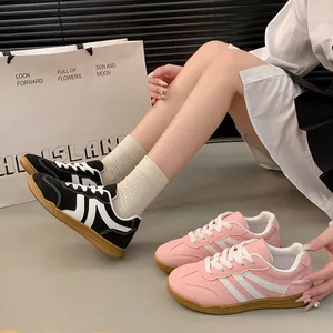 Baskets rétro style German Army Trainer pour femmes en noir-blanc et rose-blanc élégantes