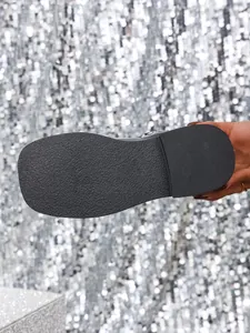 Close-up view of durable non-slip black rubber sole with 37 size engraving