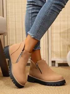 Casual camel suede ankle boots with side zipper and chunky black lug soles