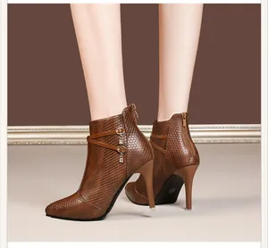 Stylish brown pointed toe stiletto ankle boots with rhinestone charms and back zipper