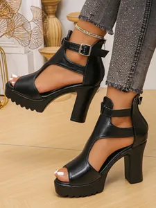 Detailed side view of black platform chunky high heel sandals with ankle strap buckle