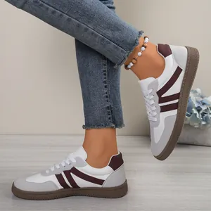 Women's stylish colorblock German army trainers with flat gum soles and lace-up design