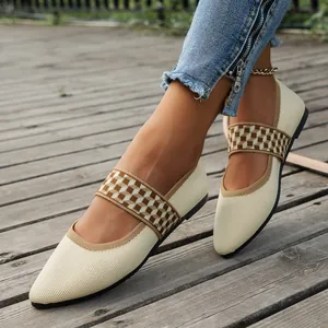 Stylish cream pointed-toe flyknit flat shoes with a decorative brown checkered strap