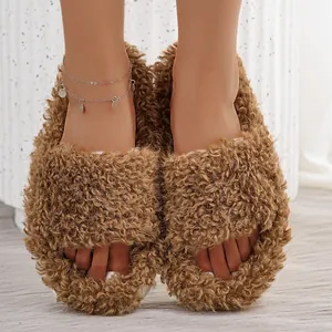 Warm and cozy brown fluffy faux fur slippers for indoor home wear with plush teddy texture