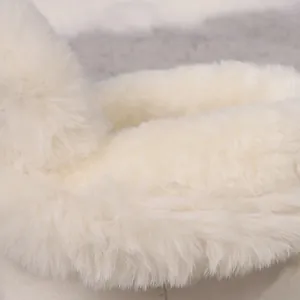 Detailed macro shot showing the soft white thick plush lining of winter snow boots