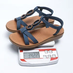 Macro detail view of lightweight blue women bohemian flat sandals weighing 342.2g