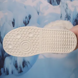Detailed view of the anti-slip texture on the sole of women's warm winter snow boots