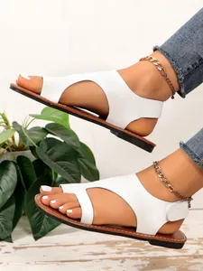 Comodi sandali bassi bianchi da donna con infradito e cinturino regolabile in velcro