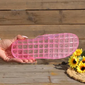 Detail view of the pink translucent hollow grid sole for non-slip crystal slippers