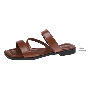Detailed view of brown flat sandals showing 2.5cm heel height with square toe.