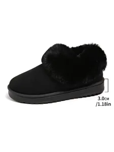 Close-up detail of black faux fur snow boot with 3.0cm platform sole height measurement