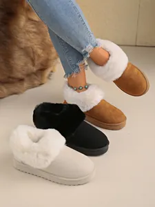 Multiple colors of cozy women's snow boots with plush faux fur lining and flat warm soles