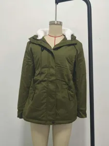 Detailed macro view of an olive green winter hooded parka jacket with warm white faux fur lining