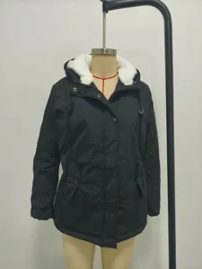 Women's black winter parka jacket with white fleece-lined hood and button closure