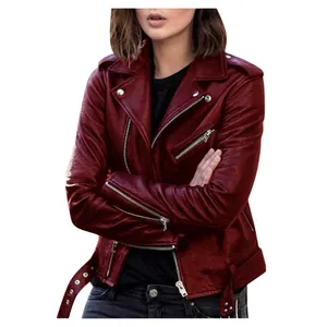 Detail view of a stylish slim-fit burgundy faux leather biker jacket for women on model