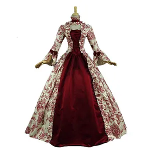 Victorian style evening gown with floral patterns and bell sleeves displayed on a mannequin.