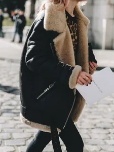 Stylish women's black faux leather aviator jacket with warm beige shearling lining