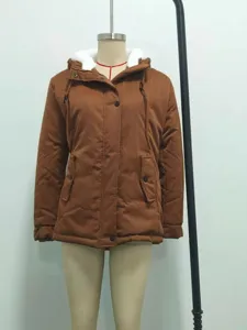 Side view of a thick brown winter parka with a white fleece-lined hood on a mannequin.