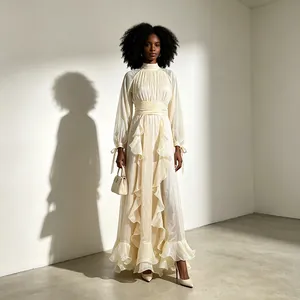 Full view showing elegant ruffles and high collar of the cream vintage maxi dress