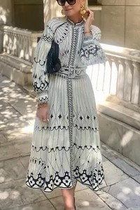Elegant court style long-sleeved printed maxi dress with belt for a sophisticated look