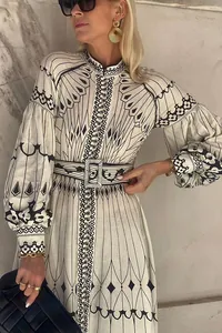 Elegant palace style printed long sleeve dress with a matching belt detail view