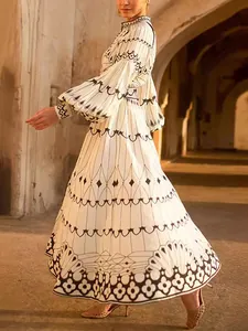 Elegant court style long sleeve printed maxi dress with black patterns in ancient architecture