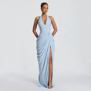 Elegant light blue halter V-neck evening gown with pleated bodice and side slit