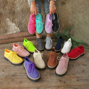 Colorful women's fly-knit sneakers with thick soles and lace-up design in various colors