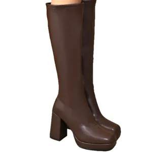 Elegant brown chunky heel platform stretch knee-high boots with square toe design.