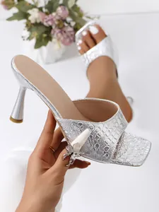 Elegant silver square toe high heel mules featuring realistic stone texture and kitten heel