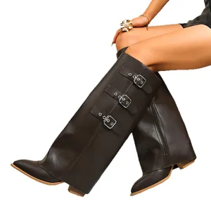 Vintage brown leather gaiter boots featuring pointed toe and triple buckle straps for women