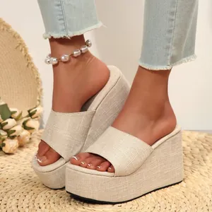 Detailed macro view of beige linen wedge platform sandals for women summer style