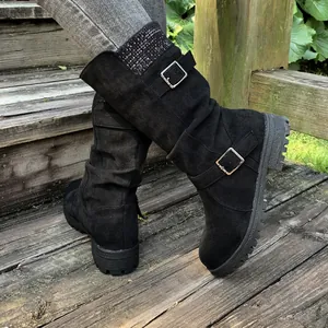 Stylish black suede mid-calf boots with buckle straps and a knitted collar detail