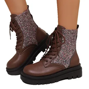 Stylish brown glitter lace-up Martin boots for women featuring a thick platform lug sole