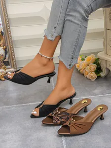 Elegant pointed toe kitten heel mules featuring peep-toe design in multiple colors