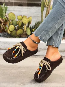 Stylish brown suede clogs for women with bohemian bead accents and thick non-slip soles