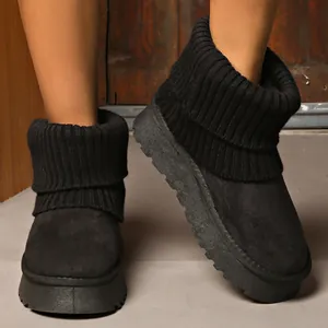 Women's black platform snow boots with knitted collar and plush lining for winter warmth