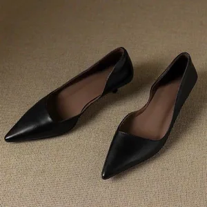 Side view showing elegant black pointed-toe kitten heel pumps for professional wear.
