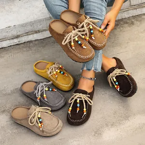 Bohemian style suede platform mules for women with colorful beaded lace-up details