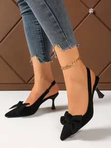 Elegant black pointed-toe slingback kitten heels with stylish bow detail for women