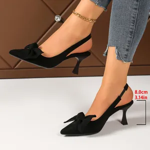 Elegant black pointed-toe slingback heels with bow detail and 8cm kitten heel