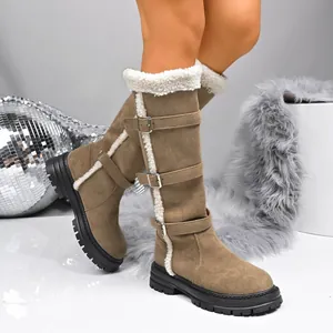 Women's tall snow boots with warm faux fur lining and buckle straps on platform sole