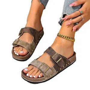 Women's brown buckle slide sandals with rivet details and open toe for summer wear