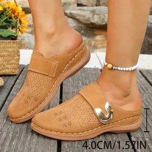 Stylish brown hollow-out mules for women with metal buckle and 4cm stable heel