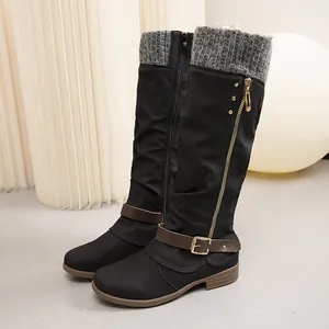 Black round toe knee-high boots with decorative belt buckle and knitted collar detail